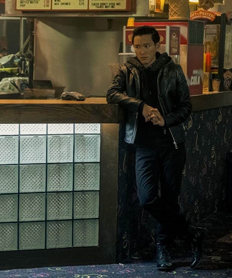 Ben Hargreeves group and couple costume reference from The Umbrella Academy showing the full all-black layered look with hoodie and leather jacket