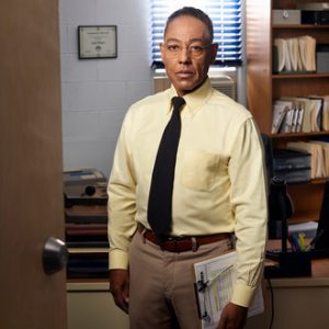 Giancarlo Esposito as Gus Fring in his signature navy suit before the Face Off explosion