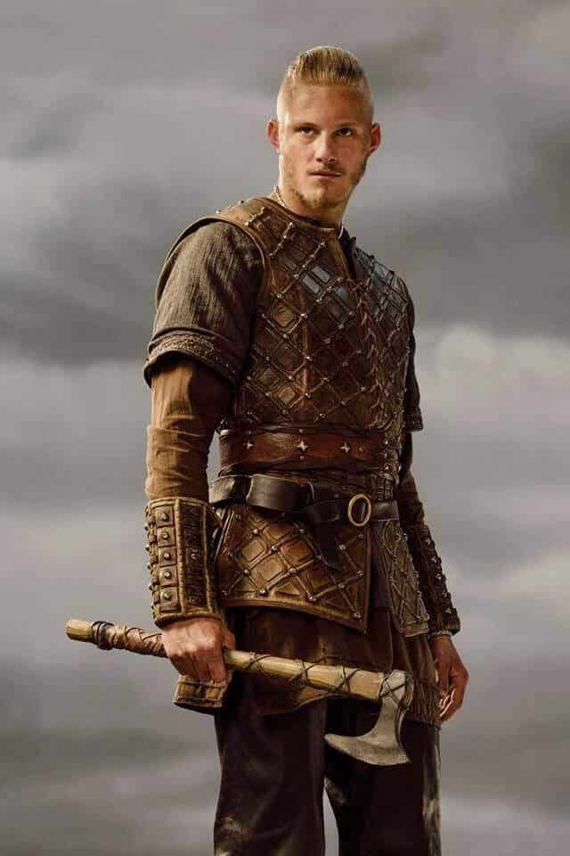 Bjorn Ironside in leather armor with a fur shawl and shield, a costume reference from Vikings