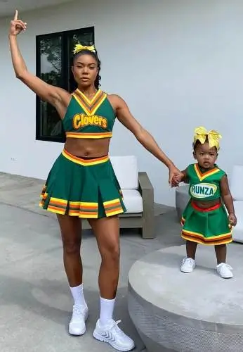 Gabrielle Union and her daughter as Clovers Cheerleaders