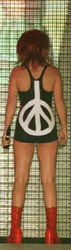 Ginger Spice in a peace sign dress