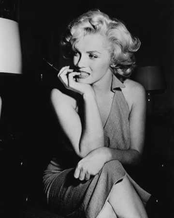 Marilyn Monroe Halloween costume cosplay reference showing the complete white halter dress, platinum blonde wig, red lips, pearl earrings, and white heels assembled as the full iconic look