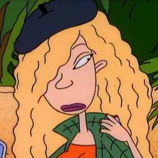 Debbie Thornberry cosplay reference showing green plaid flannel open over orange crop top, ripped wide-leg jeans, and curly blonde wig