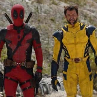 Deadpool and Wolverine cosplay group reference — yellow-and-blue comic suit with premium cowl