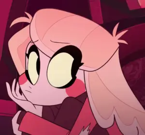 Charlie Magne the Princess of Hell from Hazbin Hotel smiling in her red and black suit