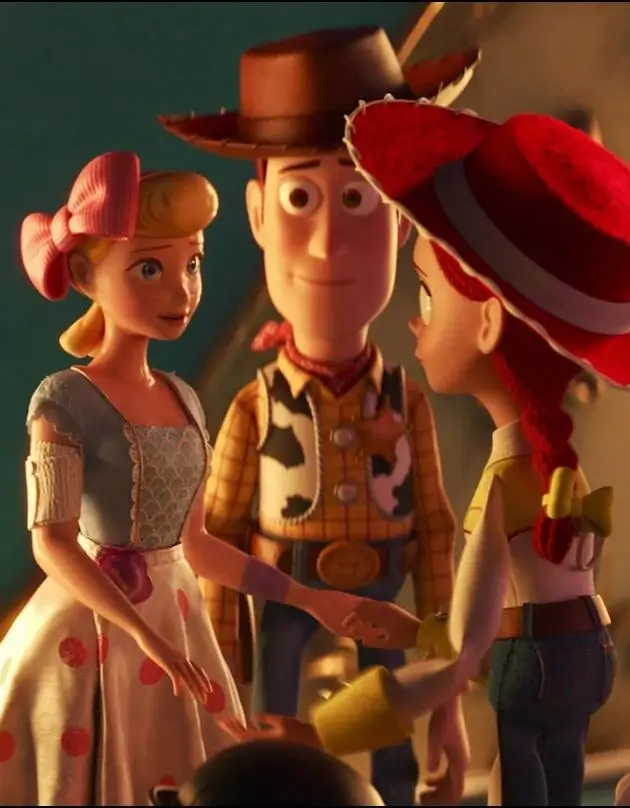 Bo Peep, Woody, and Jessie from Toy Story together, showing the distinct costume colors and looks for the group Halloween costume concept