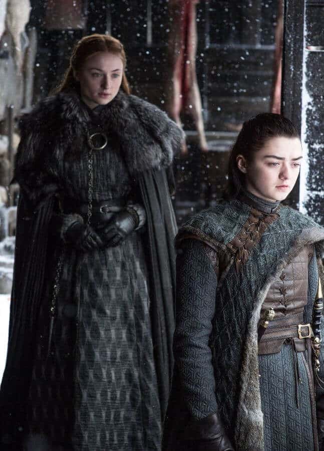 Sansa Stark and Arya Stark in Game of Thrones showing the sisters reunited at Winterfell as a duo Halloween costume reference