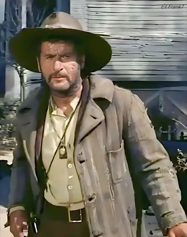 Eli Wallach as Tuco Ramirez in The Good, the Bad and the Ugly wearing wide-brim straw hat, layered suede vest and wool coat, and drooping Zapata moustache, used as Halloween costume styling reference