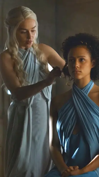 Missandei and Daenerys Targaryen in Game of Thrones showing their advisor and queen dynamic used as a Halloween costume styling reference
