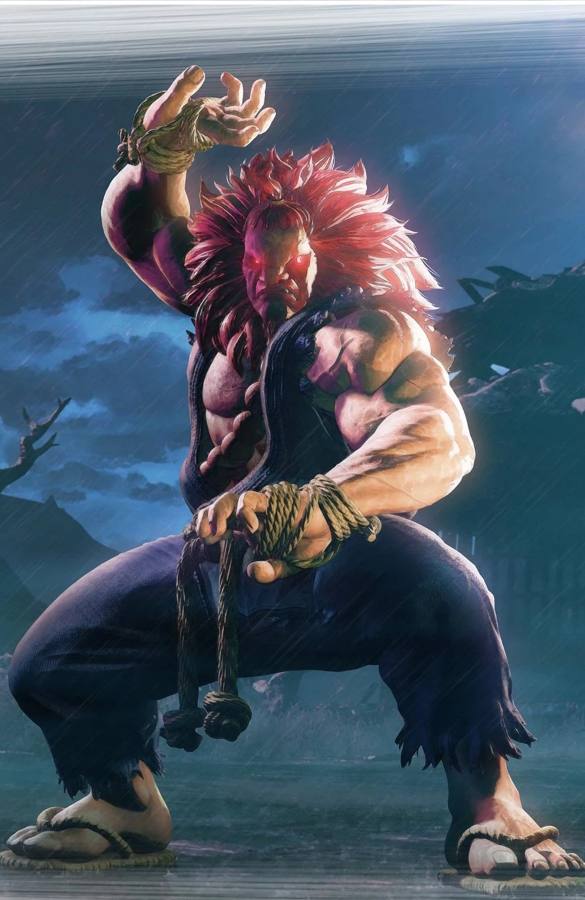 Cosplayer dressed as Akuma from Street Fighter wearing a torn sleeveless gi and large wooden prayer beads