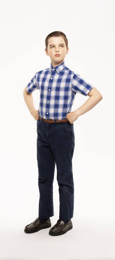 Young Sheldon full body Halloween costume reference showing the plaid shirt, khaki pants, and belt for a family group costume idea