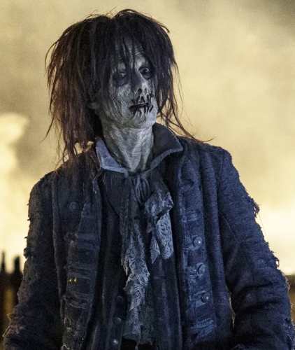 Billy Butcherson zombie makeup Halloween costume reference showing green and black body paint blending with the butcher mask