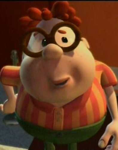 Carl Wheezer close-up costume reference showing curly orange wig and round orange glasses