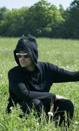 David Rose in his black layered outfit from Schitt's Creek, reference image for the group costume section