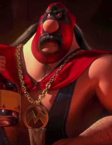 El Macho close-up costume reference showing lucha libre mask and gold M necklace