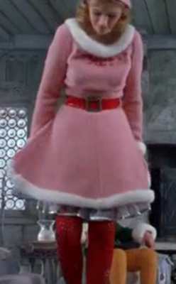 Jovie from Elf costume reference showing pink dress and elf hat