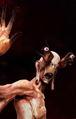 Pale Man from Pan's Labyrinth with eyeballs mounted into the palms of his hands