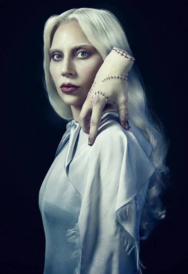 Reference image of the Addams Family Thing hand prop pose to pair with a Rosaline Rotwood Wednesday Halloween costume