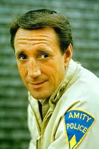 Chief Brody from Jaws in a scene wearing the full police uniform