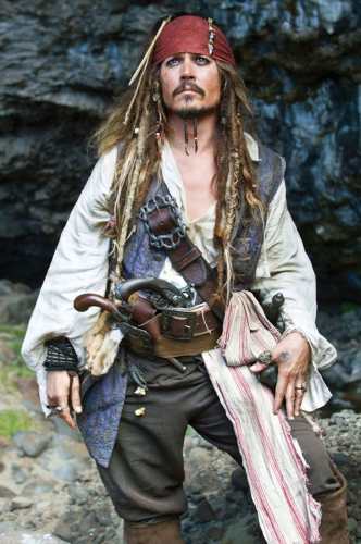 Jack Sparrow wearing full pirate coat, tricorn hat, and dreadlock wig with kohl eyeliner
