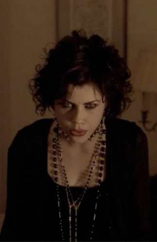 Fairuza Balk as Nancy Downs in The Craft 1996 wearing the black leather jacket and spiked choker look