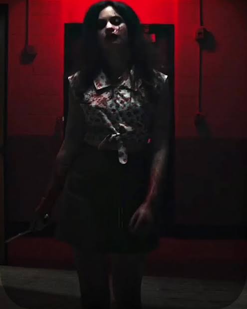 Ruby Lane possessed costume reference from Fear Street Part 2: 1978 showing the wrist scars and blood effects
