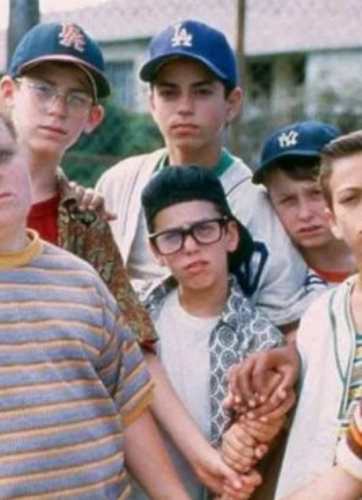 Squints from The Sandlot costume reference showing the striped shirt, thick glasses, and backwards baseball cap