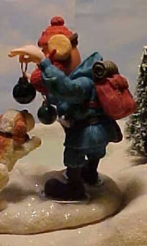 Yukon Cornelius stop-motion character reference from Rudolph the Red-Nosed Reindeer showing the bushy beard, blue parka, and pickaxe