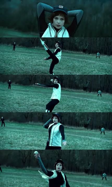 Sequence of Alice Cullen's baseball wind-up and pitch from the Twilight film, showing the cap, jersey, and high kick pose in motion