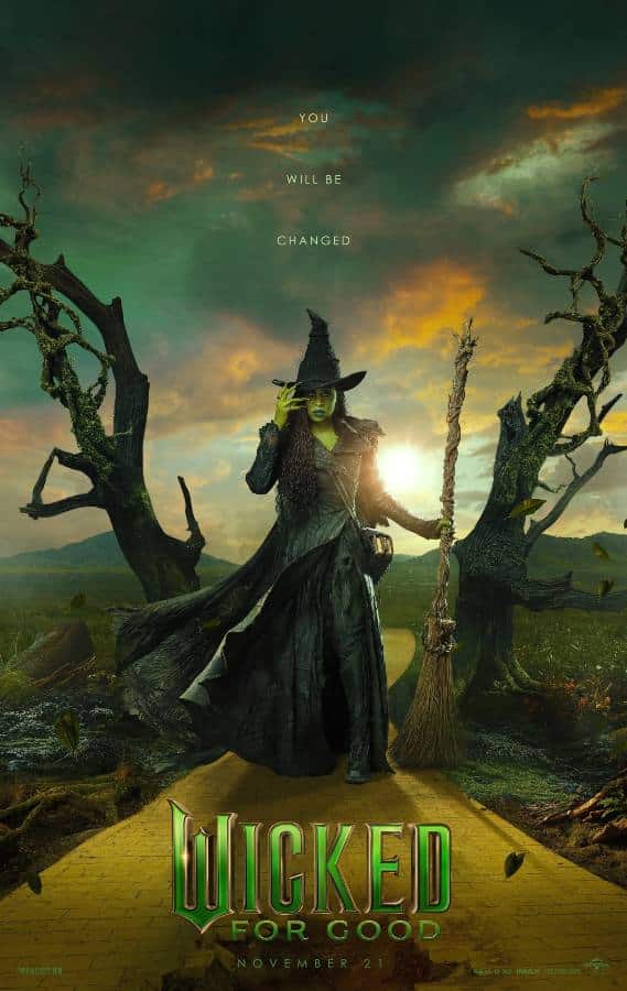 Elphaba in her black witch coat and pointed hat from the Wicked movie, reference image for the Halloween costume