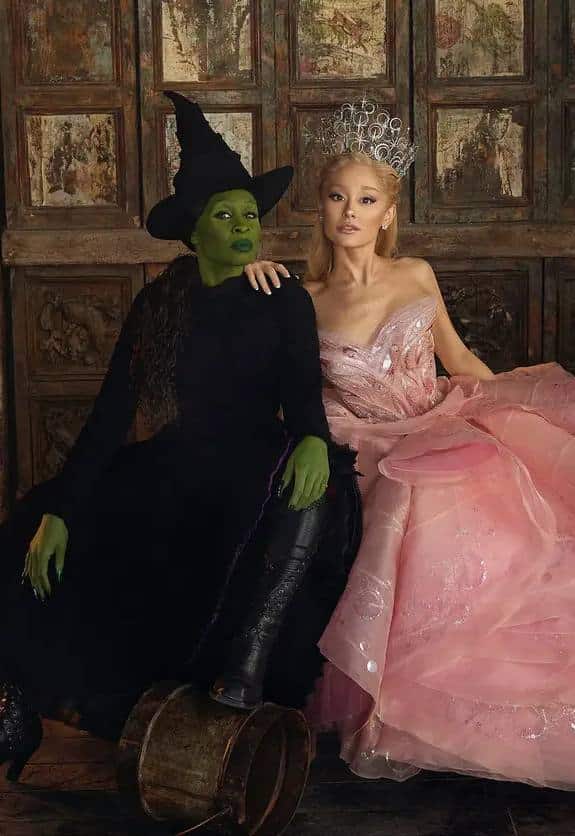 Elphaba and Glinda together in their contrasting green and pink looks from Wicked, reference for a duo Halloween costume