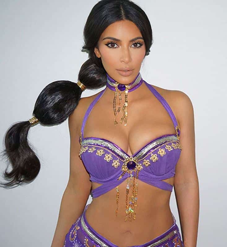 Kim Kardashian in a purple jeweled Princess Jasmine costume for Halloween 2016