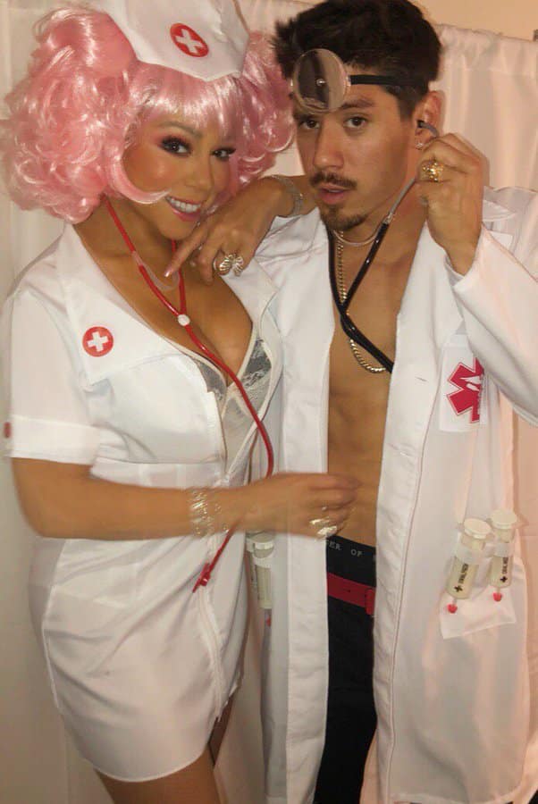 Mariah Carey in a sexy nurse costume with Bryan Tanaka as a doctor for Halloween 2018