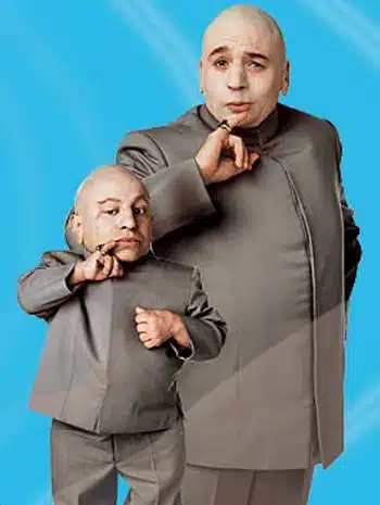 Mini Me and Dr. Evil standing together in matching grey Nehru-collar suits, reference image for a Mini Me and Dr. Evil Halloween costume duo