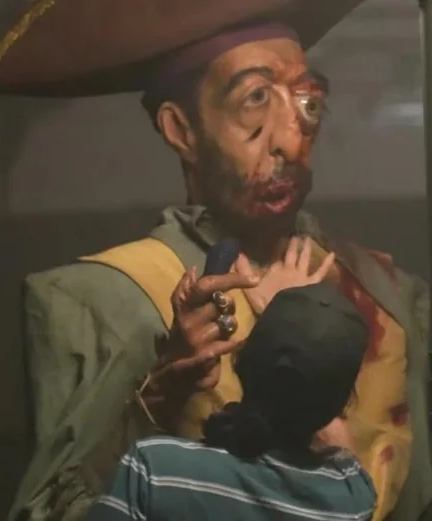 Close-up reference image of Pirate Clark from Backrooms in the mustard yellow and mint green costume with bloodstained shirt